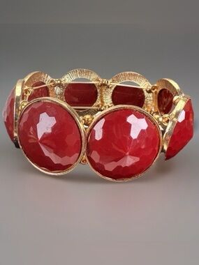 Goldtone, rust color costume stretch bracelet